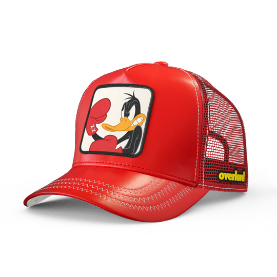 Red faux leather trucker cap hat with Looney Tunes Boxing Daffy Duck woven patch against a white background