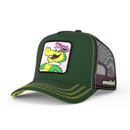 Dark green twill trucker cap with black mesh featuring a woven patch of Wally Gator from the classic Hanna-Barbera cartoons attached to the crown.