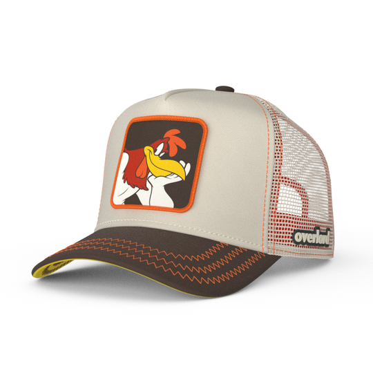 Beige and brown trucker cap with a Foghorn Leghorn patch against a white background