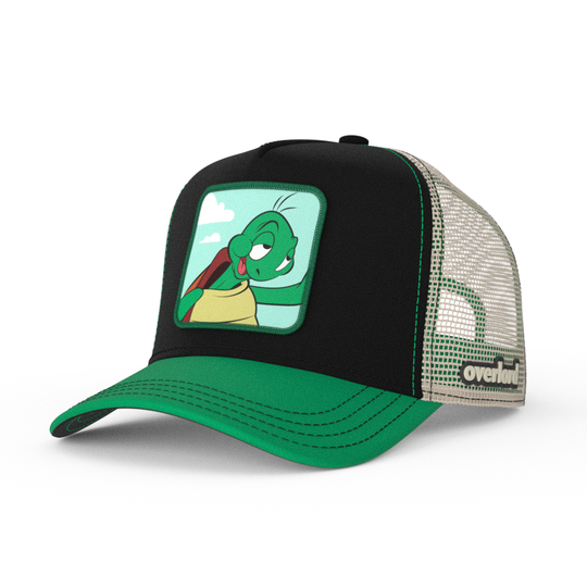 Black and green twill trucker cap with khaki mesh featuring a woven patch of Cecile the Turtle from the Looney Tunes attached to the crown.