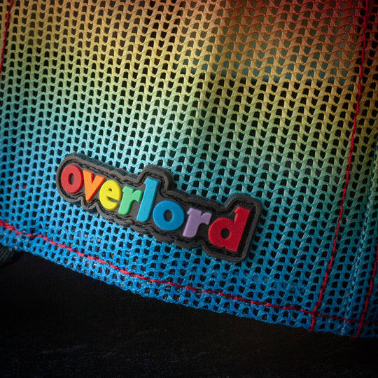 Close-up of rainbow trucker cap mesh and rainbow Overlord PVC patch