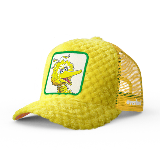 Yellow faux fur trucker cap hat featuring Big Bird from Sesame Street on woven patch attached to crown