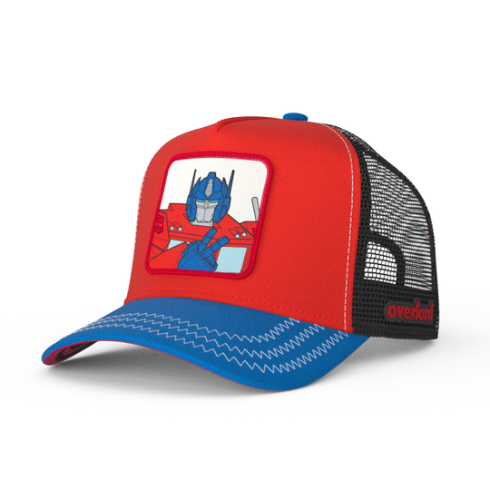 Red and blue trucker cap hat featuring Optimus Prime from Transformers on woven patch attached to crown