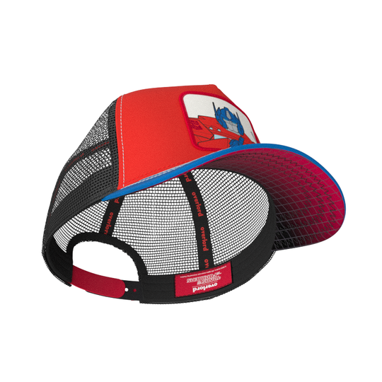 Inside view of red and blue trucker cap hat featuring Optimus Prime from Transformers on woven patch attached to crown