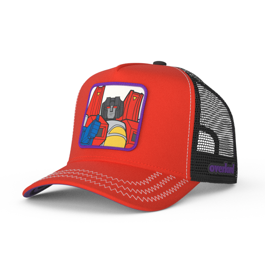 Red trucker cap hat featuring Starscream from Transformers on woven patch attached to crown