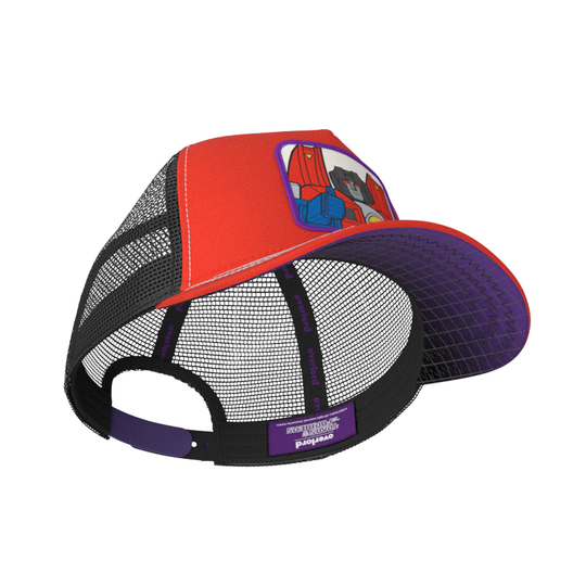 Inside view of red trucker cap hat featuring Starscream from Transformers on woven patch attached to crown