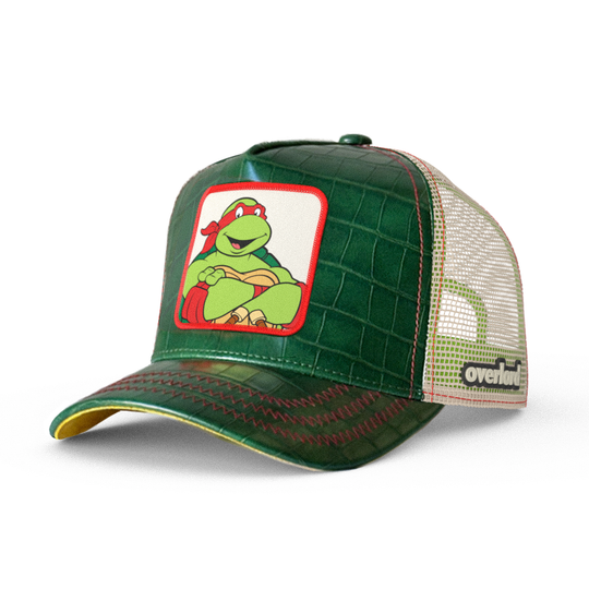 Green faux crocodile leather trucker cap featuring a woven patch of Raphael from Teenage Mutant Ninja Turtles attached to the crown.