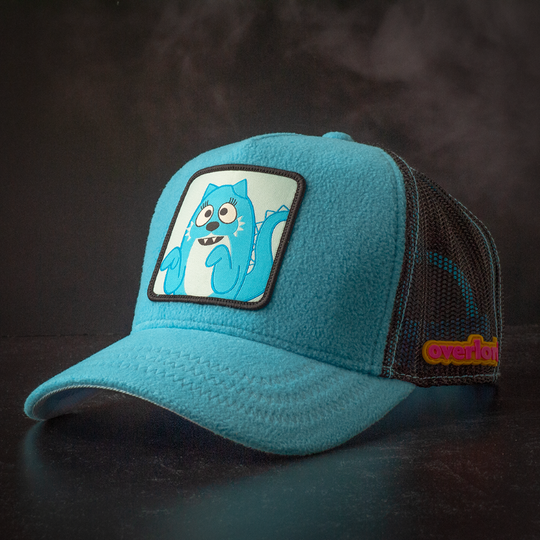 Blue fleece trucker cap hat featuring Toodee from Yo Gabba Gabba on woven patch attached to crown