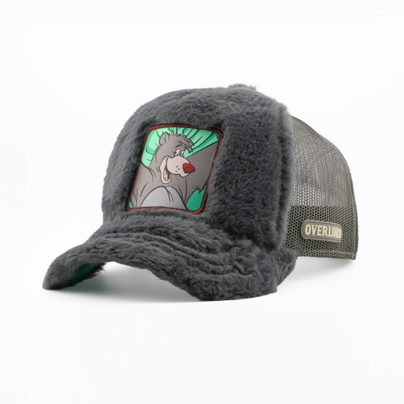 Gray fleece-lined cap with cartoon character patch on a white background