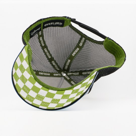 Underside of the Beaker retro trucker cap, showing a green checkered brim, a Disney tag, gray mesh crown, and green Overlord branded taping with white text.