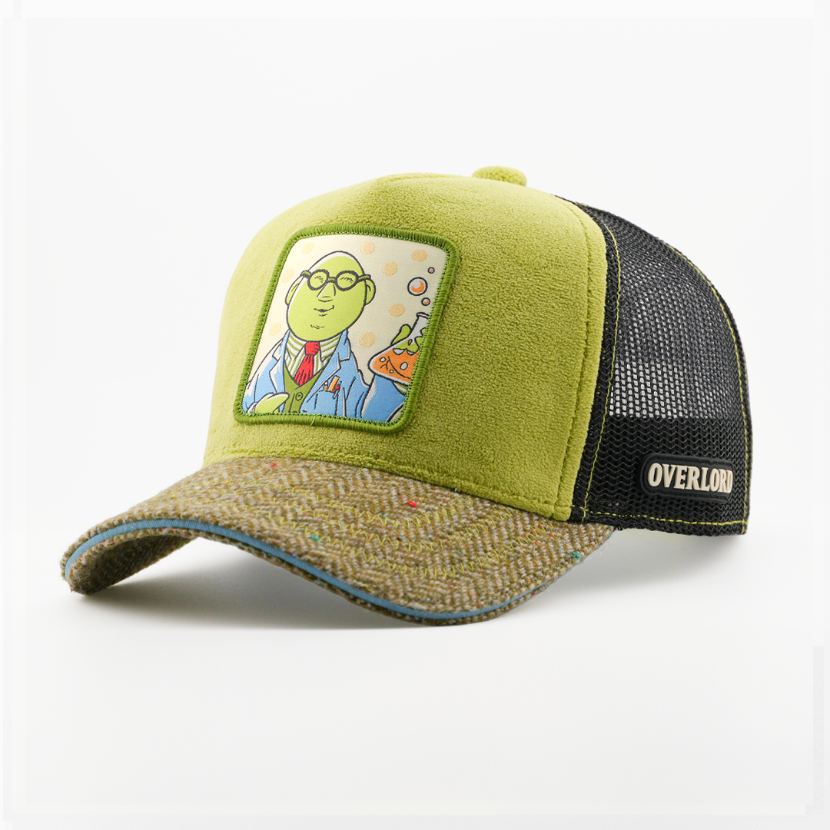 Suede-textured olive green retro trucker cap with a tweed-textured brown brim and a patch of Dr. Bunsen from The Muppets holding a beaker on a polka-dot background, black mesh back with tan Overlord logo.