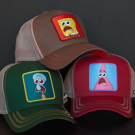Brown OVERLORD X SpongeBob surprised face trucker baseball cap hat with red zig zag stitching. PVC Overlord logo.