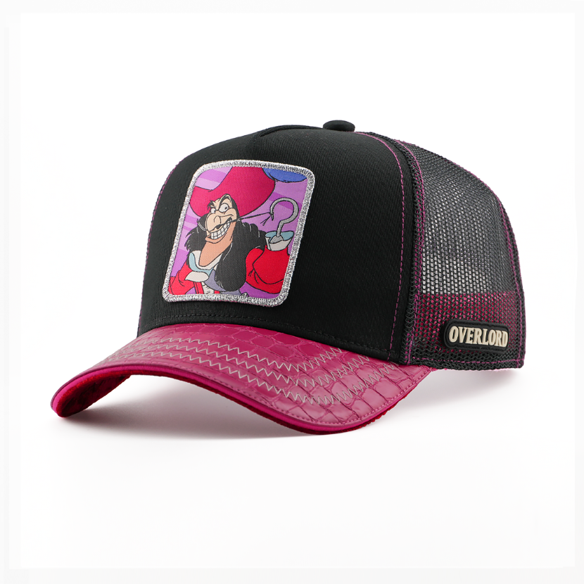 Black retro trucker cap with a croc-print magenta brim and a patch of Captain Hook from Disney's Peter Pan on a purple background, black mesh back with tan Overlord logo.