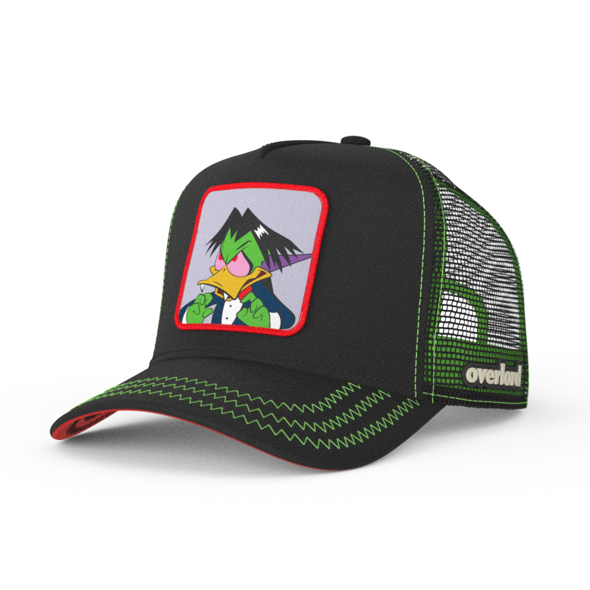 Black twill trucker cap with black mesh featuring a woven patch of Count Duckula attached to the crown.