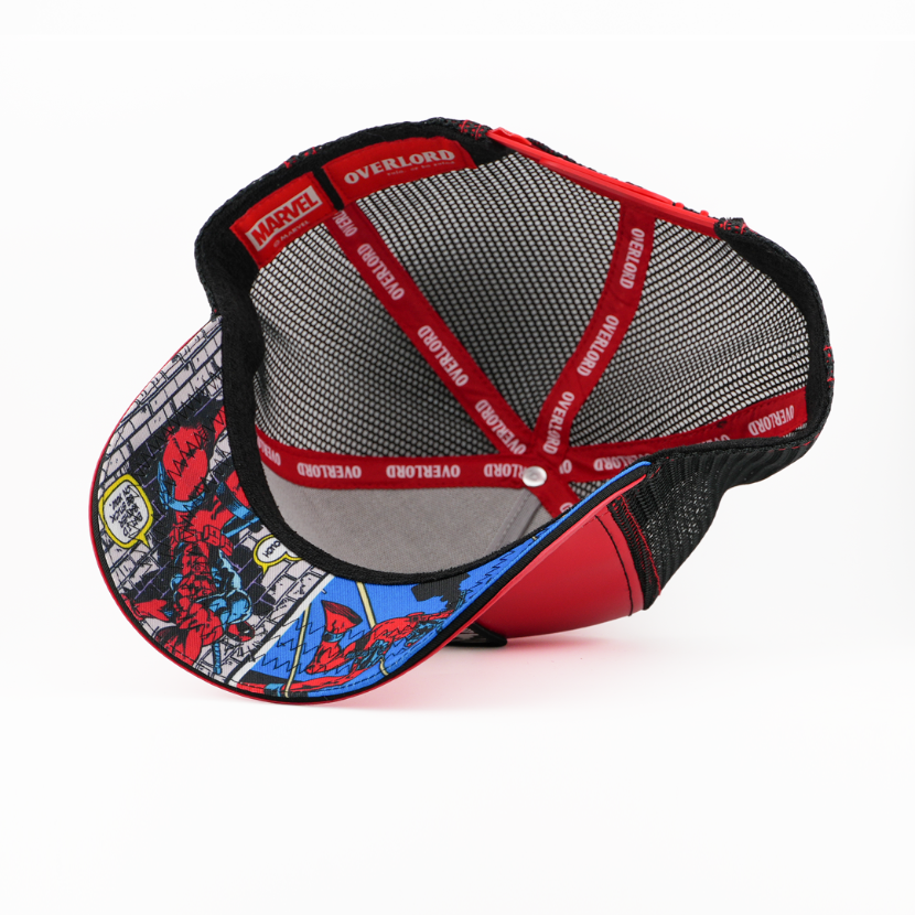 Underside view of the Deadpool cap showing a comic-print brim, black mesh crown, and red Overlord branded taping.