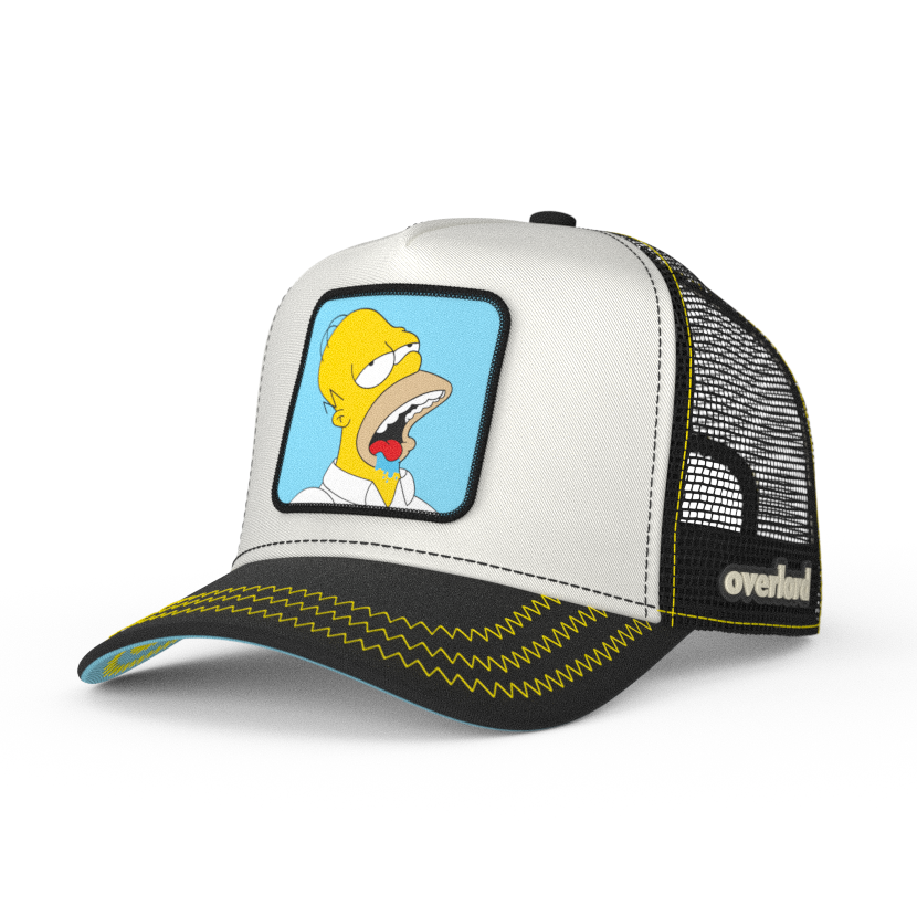 White and black OVERLORD X The Simpsons Homer drooling trucker baseball cap hat with yellow zig zag stitching. PVC Overlord logo.