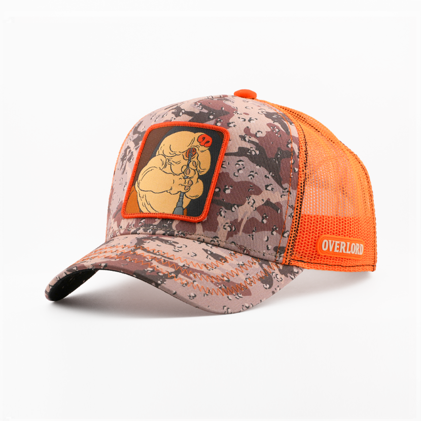 Camo-print trucker cap with Droopy McCool from Star Wars playing his instrument patch, orange trim and mesh sides, and Overlord logo.