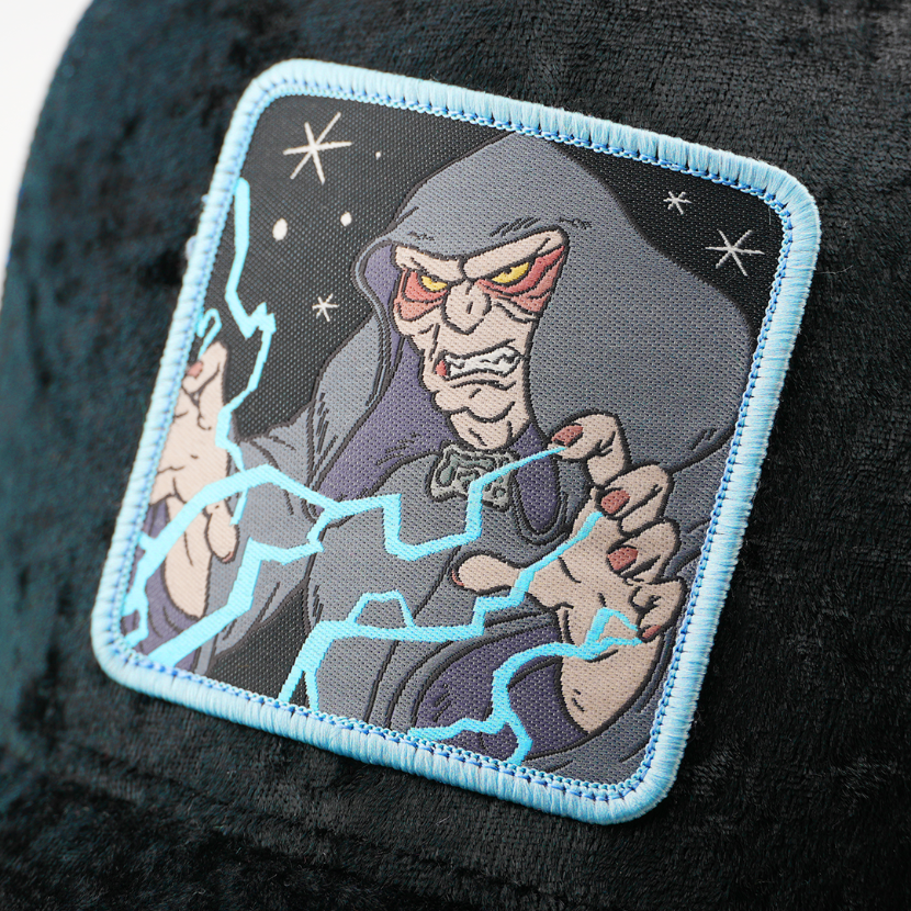 Close-up of the Emperor Palpatine from Star Wars patch shooting lightning from his hands, stitched onto the black velvet trucker cap fabric.