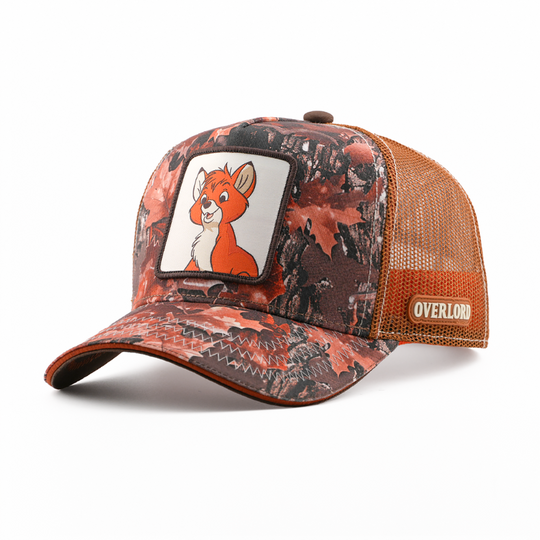 Rust and brown leaf-camo-print retro trucker cap with Tod from Disney's The Fox and the Hound patch on a white background, brown mesh sides, and an Overlord logo.