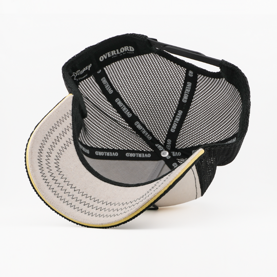 Black and white cap with 'Overlord' branding on a white background