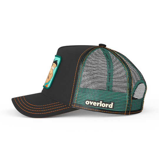 Black OVERLORD X Flintstones Fred Flintstone trucker baseball cap with black mesh. PVC Overlord logo.