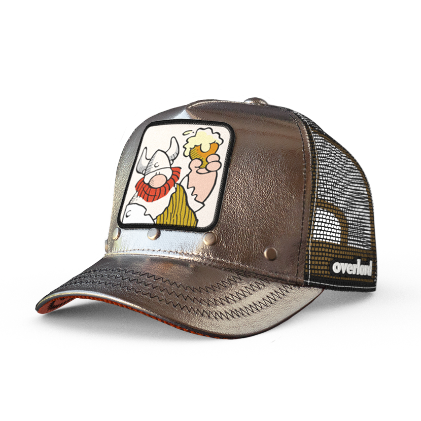 Metallic silver trucker cap hat with Hagar the Horrible woven patch against a white background