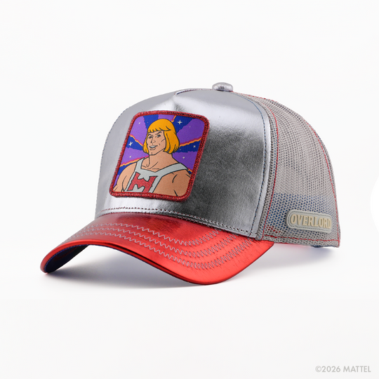 Metallic silver retro trucker cap with a red-bordered patch of He-Man from Masters of the Universe, red metallic brim, grey mesh back, and Overlord logo.