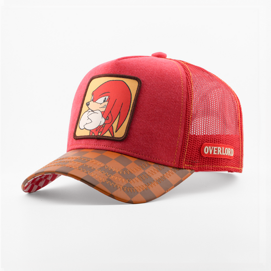 Red retro trucker cap with a dark-bordered patch of Knuckles from Sonic the Hedgehog on a tan background, brown checkered-pattern brim, red mesh back, and Overlord logo.