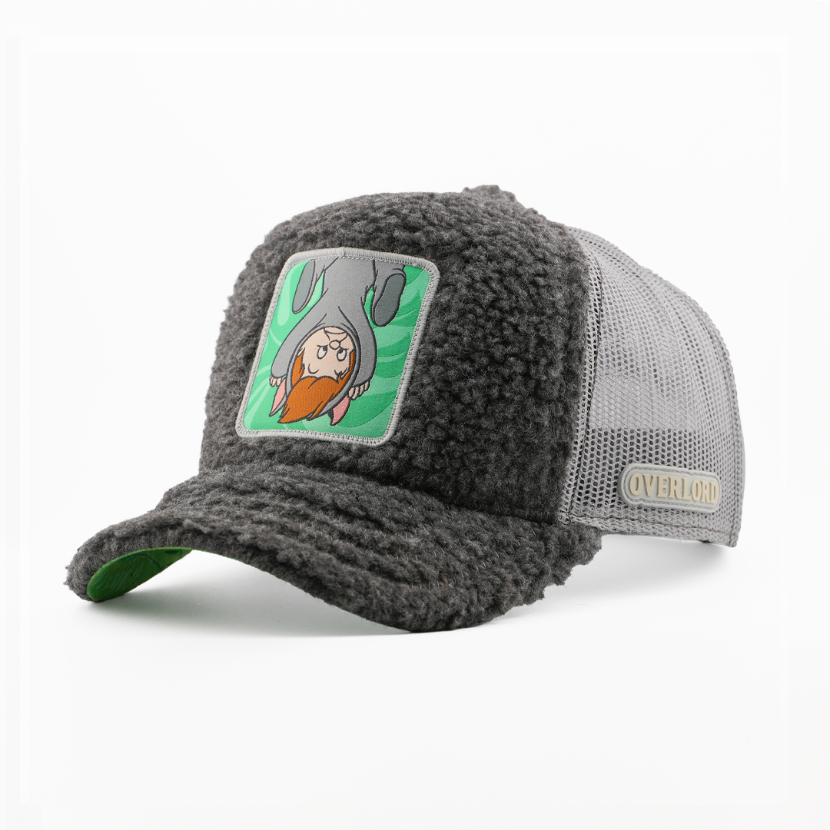 Charcoal boucle-textured Second Twin from Disney's Peter Pan retro trucker cap with a green underbrim, gray mesh side, and Overlord logo.