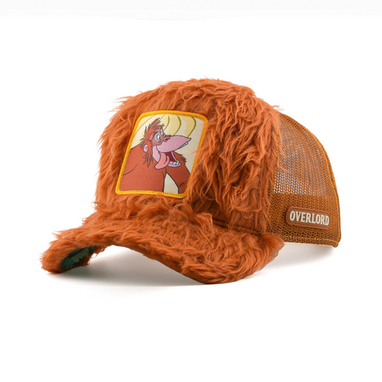 Orange fuzzy cap with a cartoon character patch and 'Overlord' branding on a white background