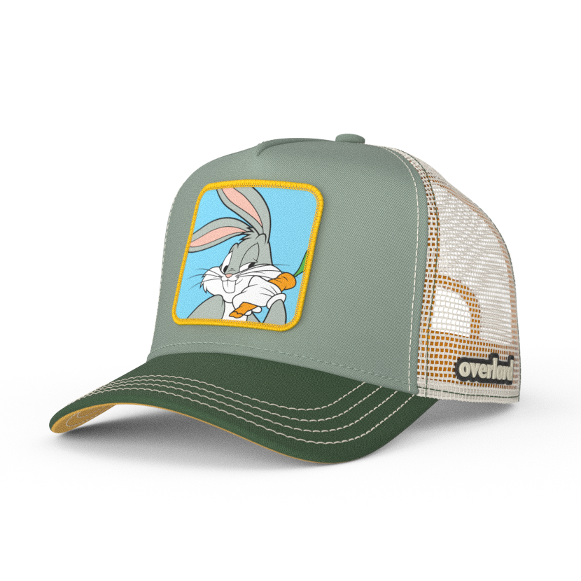 Gray green OVERLORD X Looney Tunes Bugs Bunny trucker baseball cap hat with cream stitching. PVC Overlord logo.