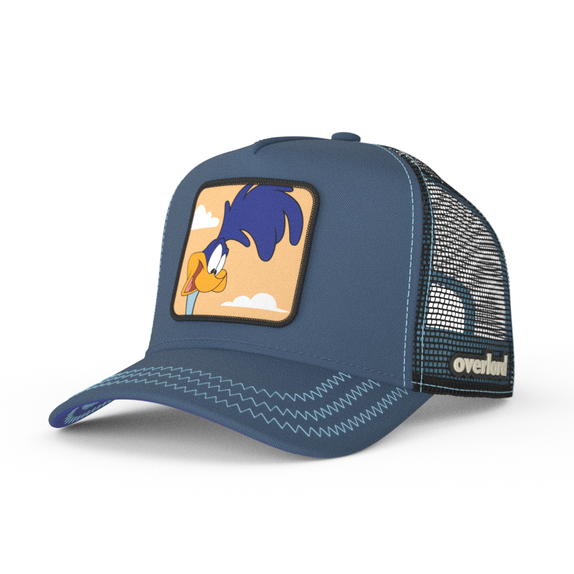 Blue OVERLORD X Looney Tunes smiling Road Runner trucker baseball cap hat with light blue zig zag stitching. PVC Overlord logo.
