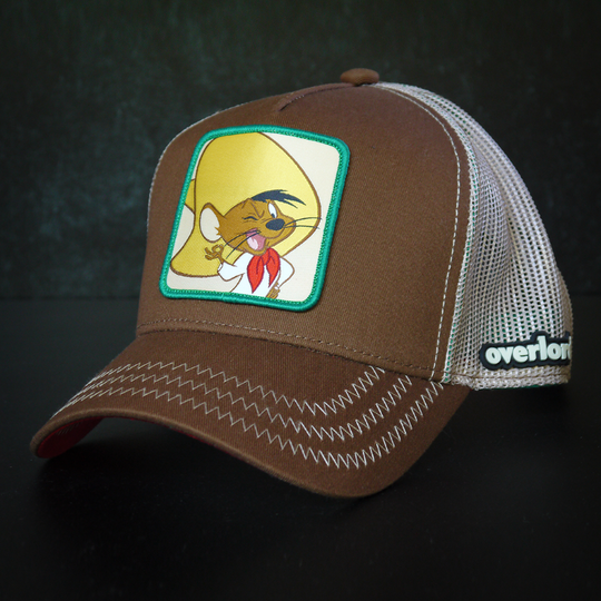 Brown OVERLORD X Looney Tunes Speedy Gonzales trucker baseball cap hat with khaki zig zag stitching. PVC Overlord logo.