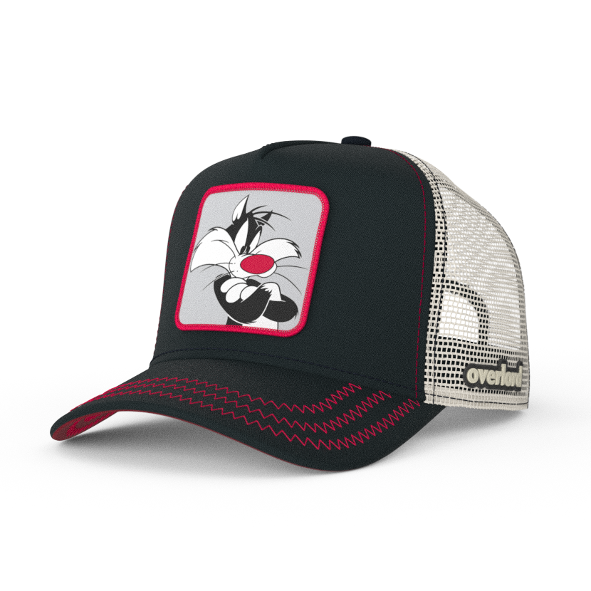 Black OVERLORD X Looney Tunes smug Sylvester the cat trucker baseball cap hat with red zig zag stitching. PVC Overlord logo.