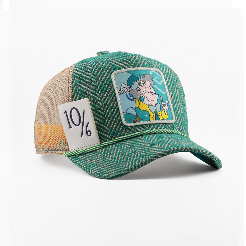 Green and beige cap with cartoon patch and number 10/6 on a white background