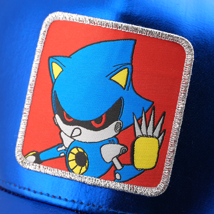 Woven patch of Metal Sonic from Sonic the Hedgehog with red eyes and metallic claws, set against a red background with silver border, stitched onto the metallic blue retro trucker cap.