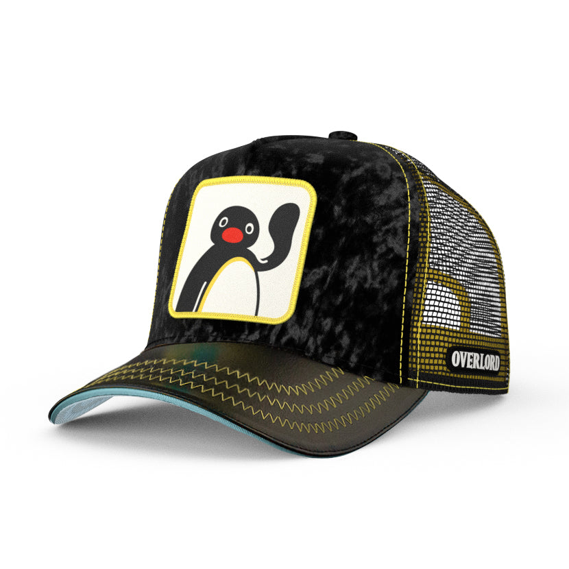 Trucker cap with Pingu patch, black crown and black brim with yellow stitching.