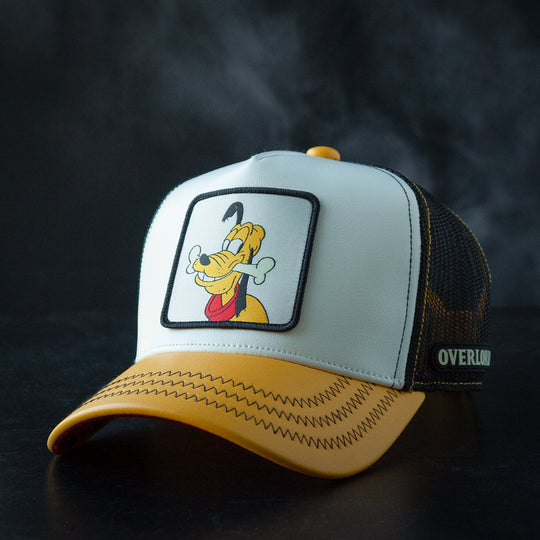 Trucker hat with cartoon character patch on a dark background