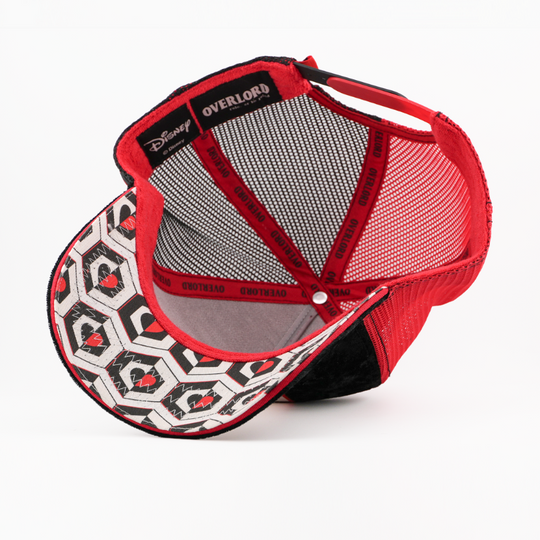 Red cap with geometric pattern on the brim and 'Overlord' branding on the interior, on a white background.