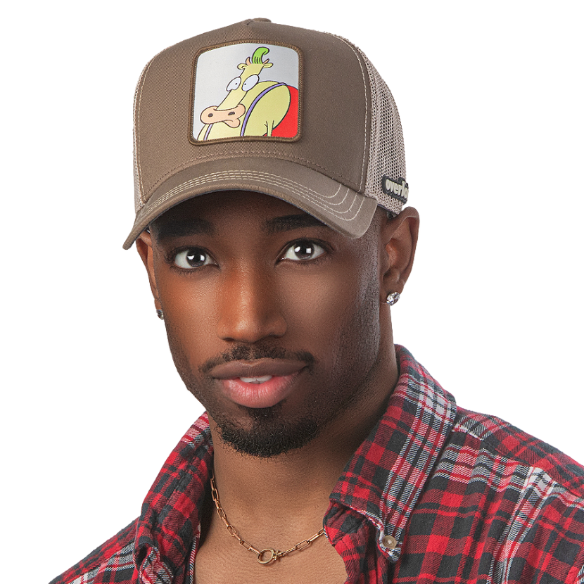 Man wearing dark tan OVERLORD X Rocko's Modern Life Heffer Wolfe trucker baseball cap hat with khaki stitching. PVC Overlord logo.