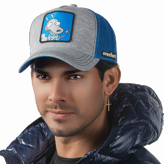 Man wearing heather gray jersey OVERLORD X Rocko's Modern Life Rocko trucker baseball cap hat with black stitching. PVC Overlord logo.