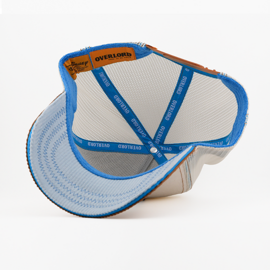 Baseball cap with blue rim and 'Overlord' branding on a white background
