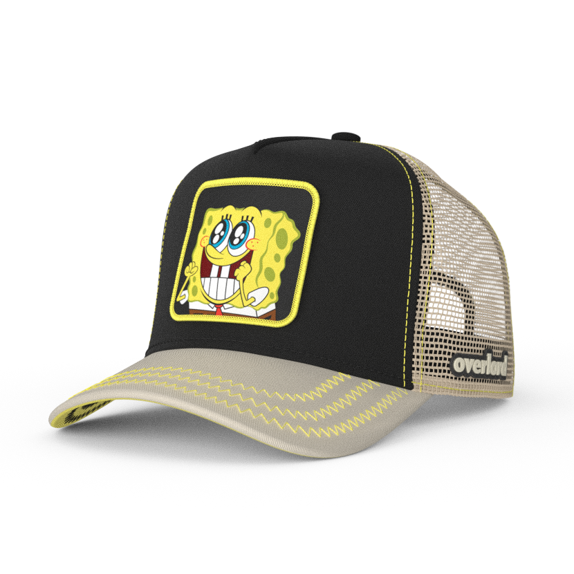 Black and tan OVERLORD X SpongeBob Big Smile SpongeBob trucker baseball cap hat with yellow zig zag stitching. PVC Overlord logo.