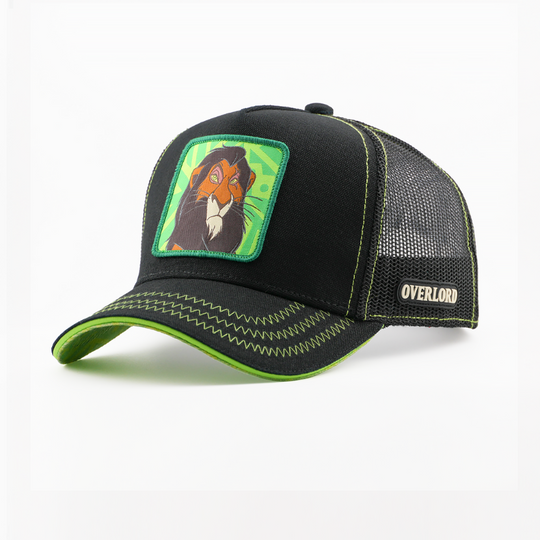 Black corduroy-textured retro trucker cap with a woven Scar from Disney's The Lion King patch on a green patterned background with a green border, green brim trim, black mesh back with Overlord logo.