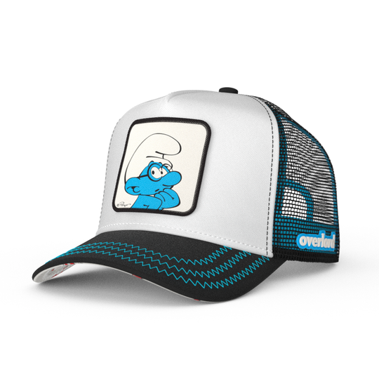 Black and white twill trucker cap with black mesh featuring a woven patch of Brainy Smurf from the Smurfs attached to crown
