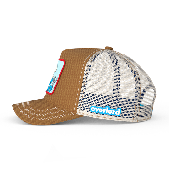 Brown workwear trucker cap with off white mesh featuring a woven patch of Handy Smurf from the Smurfs attached to the crown