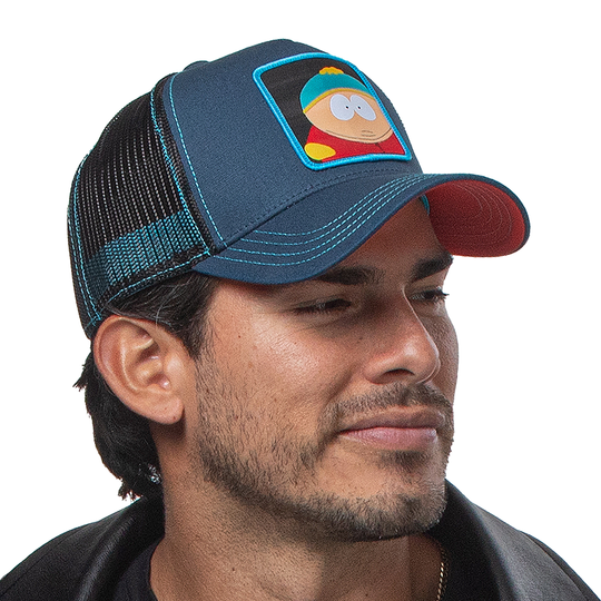 Man wearing navy South Park Eric Cartman trucker baseball cap hat with aqua stitching. PVC Overlord logo.