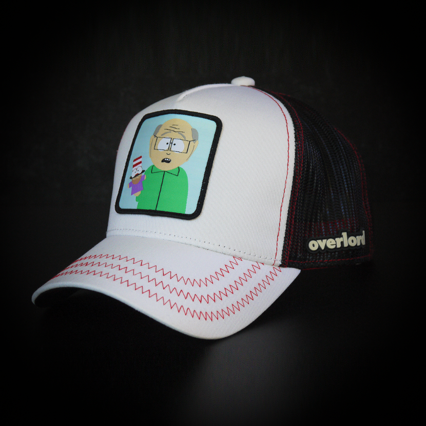 White OVERLORD X South Park Mr. Garrison trucker baseball cap hat with red zig zag stitching. PVC Overlord logo.
