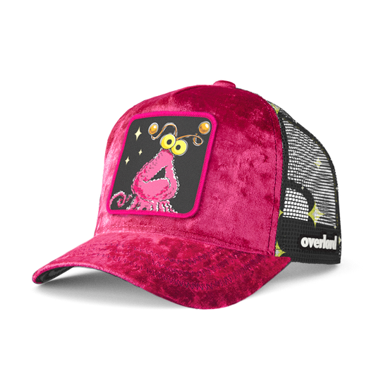 Hot pink crushed velvet trucker cap hat with Sesame Street pink yip martian woven patch against white background
