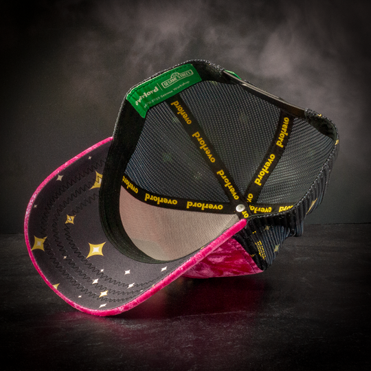 Inside view of hot pink crushed velvet trucker cap hat with space stars printed fabric underbrim